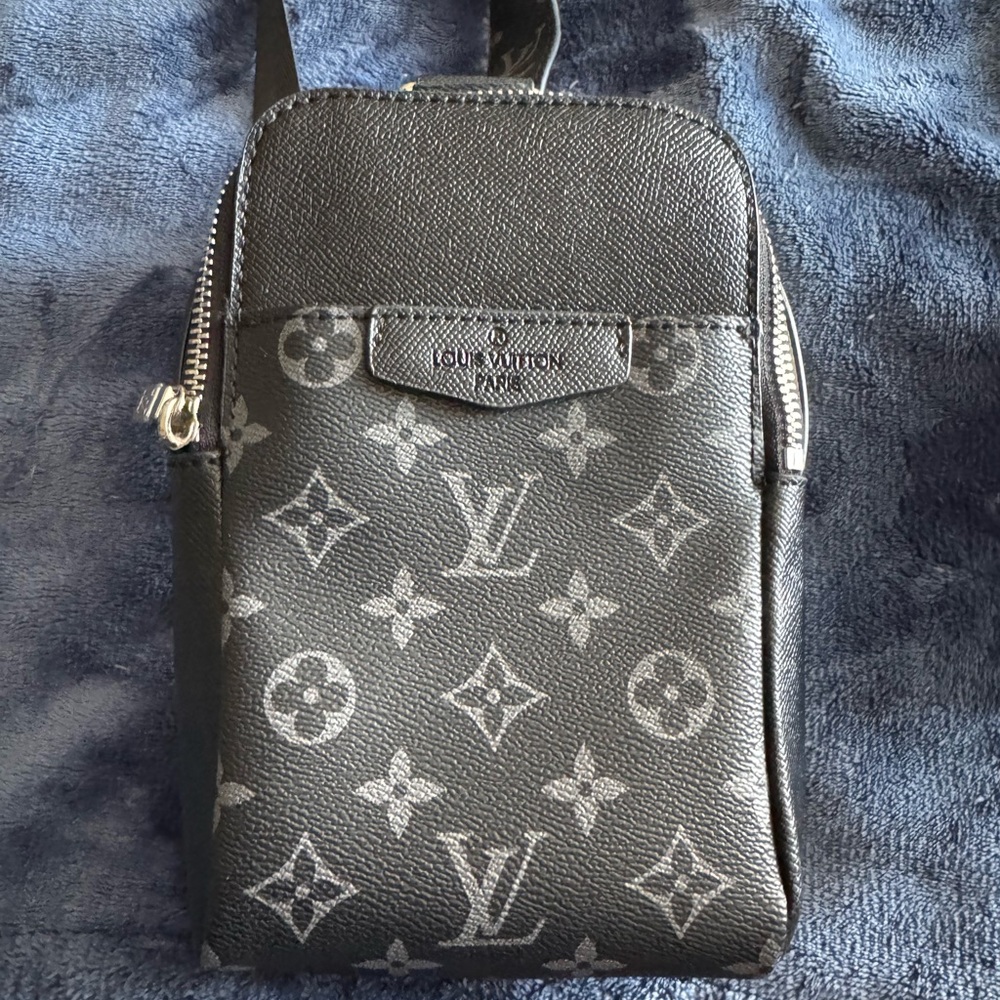 Louis Vuitton belt or sling bag.